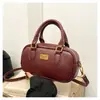Bolsa de Boliche Portátil Simples Retrô para Mulheres 2026 Versão Coreana Bolsa Transversal Almofadada para o Trabalho Bolsa de Ombro Casual da Moda