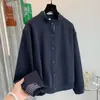 Foto real de la nueva blusa top de mujer 2026 otoño vintage artística simple de corte holgado anudada de cuello redondo adelgazante, chaqueta versátil