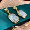 Pendientes Vintage de Segunda Mano Aguja de Plata Plisado Corazón Rojo Pendientes de Metal Pendientes Personalizados Retro Fabricante Venta al por Mayor