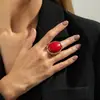 Pendientes de botón geométricos ovalados de resina vintage minimalista plateados, estilo europeo y americano, únicos y audaces, con un toque de alta gama, anillo de nicho para mujer