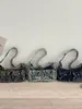 Moda Nueva 2026 Bolso Cruzado de Hombro para Axila de Mezclilla Vintage con Múltiples Bolsillos Diseño de Nicho Bolso de Mano para Viajes