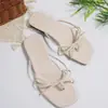 Sandalias retro de estilo francés con tiras finas para mujer, nuevo modelo de verano 2026, chanclas de playa sencillas antideslizantes de suela plana, ligeras