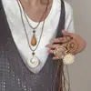 Collar Colgante Trenzado de Cuerda de Cuero y Ratán Estilo Vacaciones Isleñas Bohemias Cadena para Clavícula con un Diseño Único para Mujeres