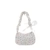 Bolso de axila de gran capacidad estilo coreano original para mujer, nuevo de verano, versátil para viajes, bolso de hombro de lona floral, bolso de tela de nicho