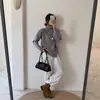 Jersey de punto blanco con cuello de solapa y media cremallera para mujer en Otoño e Invierno Nuevo Suéter holgado con abertura Top de punto para usar debajo
