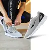 Zapatos Deportivos Hongxing Erke Verano Nuevos Zapatos de Hombre Ligeros Suela Suave Zapatos para Correr Transpirables Negros Zapatos Deportivos Zapatos de Hombre