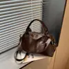 Bolsas de Venta Caliente Transfronterizas para Mujer Bolso de Mano Retro de Cuero Suave Bolso de Almacenamiento Casual para Viajes Bolso de Hombro Cruzado de Gran Capacidad