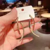 Pendientes Minimalistas de Borla con Líneas Cruzadas 2025 Nuevos de Moda Ins Diseño de Nicho Lujo Accesible Pendientes de Gama Alta