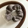 Goma de pelo de estilo coreano simple a rayas para mujer, coleta de estilo coreano de alta gama que no daña el cabello