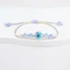 Pulseira de Flores Naturais Secas Narciso com Contas Rachadas de Gelo Jingdezhen, Pulseira Trançada de Amizade para Mulheres, Moda Popular Transfronteiriça para o Verão
