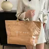 Nuevo Bolso de Mano para Mujer de Gran Capacidad, Cara Brillante de Nicho, Moda Vintage, Bolsa de Compras de Papel DuPont, Bolso Tote Casual Simple