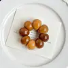 Pulsera Bodhi Grande con Diente de Ajo Envejecido, Cuentas Coleccionables Retorcidas a Mano de Intestino de Cerdo, Pulsera Unisex para Aliviar el Estrés al por Mayor