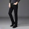 Jeans negros de alta gama para hombre en otoño e invierno, corte slim, pierna recta, business casual, elásticos, modernos, versátiles y forrados de polar