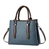 Bolso de nuevo estilo, simple y elegante, moderno y versátil, bolso de mujer para un hombro o cruzado, gran capacidad, versión coreana, bolso casual de moda