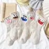 [al por mayor] calcetines de hilo de plumas de otoño e invierno para mujer, engrosados, cálidos, de caña alta, a rayas, de dibujos animados, estilo coreano ins, versátiles