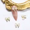 Arte de Uñas Nuevo Ojo de Gato Lazo Joyería Concha de Fritillaria Perla Mariposa Estéreo Joyería Popular de Internet Accesorios Phnom Penh