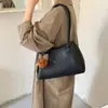Bolso de mano simple de alta costura estilo coreano, bolso tipo cubo de nicho para el día a día, nuevo modelo 2026, bolso de hombro y axila elegante y versátil