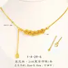 Tienda de Oro Mismo Estilo Oro Brillante 24K Hielo Triturado Moneda Ojo de Gato Borla Collar Lujo Accesible para Mujer Joyería de Nicho de Gama Alta