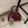 Bolsa de Boliche Portátil para Mulheres 2025 Inverno Nova Tendência Retro Bolsa Almofada para o Trabalho Bolsa Única de Alto Valor