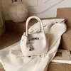 Popular Bolso Cubo Minimalista de Gama Alta para el Trabajo y los Viajes Diarios 2025 Nuevo Bolso Cruzado de Hombro Casual de Moda para Mujer