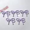 Accesorios de Plástico al por Mayor Accesorios DIY Materiales Hechos a Mano Pasadores Base para Flor de Zapato Material Base Pegamento en Crema Parche Lazo Doble