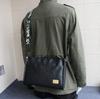 Bolsa de viagem estilo japonês Commuter Novo nicho leve de couro macio bolsa grande capacidade de grande capacidade homens bolsa de ombro crossbody bag