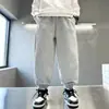 Calça de Moletom Forrada com Fleece Outono/Inverno para Meninos 2025 Nova Malha Grossa Calças Venda por Atacado Tendência