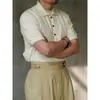 2023 Nuevo Verano Camisa Polo de Seda Helada de Manga Corta Tejida para Hombre Tendencia Moda Rayas Verticales Cuello de Solapa Camiseta Fabricante