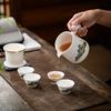 Juego de té de viaje de porcelana blanca al por mayor Taza de invitado rápida una tetera de cuatro tazas moda nacional portátil al aire libre cerámica de alta calidad mango de madera