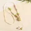 Collar con colgante de campana de mariposa de cerámica de estilo étnico retro para mujer, diseño nuevo y moderno, cadena larga para suéter, accesorios