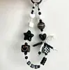 Cadena para teléfono con cara sonriente de dopamina en forma de corazón, pulsera de cuentas con lazo, cadena de muñeca Xiaohongshu, amuleto para bolso, cámara y botella de agua