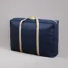 Bolsa de mudanza de tela no tejida bolsa de viaje con cordón bolsa de embalaje gran capacidad impermeable bolsa de equipaje almacenamiento de edredones y ropa
