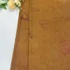 Tela satinada impresa vintage de acetato dorado para vestidos y chalecos cheongsam de mujer, con una impresión satinada reluciente