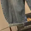 Calça jeans masculina lavada retrô para primavera e outono, tamanho grande, com design dividido tridimensional, estilosa e confortável, calça harém de corte solto
