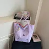 Bolsa Grande Capacidade Feminina 2026 Novo Estilo Tendência Primavera Casual Escola Trabalho Bolsa Tote Versátil de Mão e Ombro