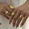 Anillo de Acero de Titanio Geométrico Irregular Nuevo y Creativo Transfronterizo Europeo y Americano con Tótem de Sol y Hoja, Anillo Apilable de Moda
