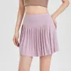 Nueva falda de tenis talla grande para mujer, falda plisada blanca de secado rápido, minifalda deportiva, media falda de bádminton anti-exposición, ropa de tenis
