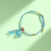 Pulsera de Hilo Rojo de Bebé de Dibujos Animados 2026 Nuevo Estilo Bendición Pequeño Zongzi Pulsera Estilo Chino Festival del Bote del Dragón Hilo de Cinco Colores Ajustable Venta al por Mayor