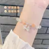 Lugar escénico el más vendido una generación de pulsera Ojo de Gato Blanco ins simple Joker fábrica al por mayor