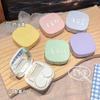 Estuche para lentes de contacto color macarrón, bonito estuche para pupilas, portátil, compacto, estilo coreano, caja de almacenamiento de alta gama.