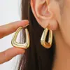 Pendientes de Lujo Ligero de Alta Gama de Venta Caliente Transfronterizos, Moda Brillante Simple, Nicho para Viajeros, Pendientes Versátiles de Otoño e Invierno
