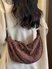 Lona fresca y elegante con estampado de leopardo 2026 nuevo modelo de verano ins de moda versión coreana bolsa tipo dumpling bolsa de axila de alto valor