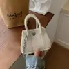 Bolso cruzado de dopamina transfronterizo para mujer 2026 nuevo nicho mini bolso para lápiz labial bolso cruzado retro bolso de cadena mini