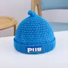 Chapéu de lã infantil coreano outono e inverno fofo chapéu de tricô versátil para meninos e meninas fofo suéter de bebê chupeta chapéu pele de melão moda