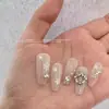 Accesorios de aleación para decoración de uñas navideña personalizados con pedrería, perlas, coronas y lazos, venta al por mayor de juegos completos de decoración para uñas