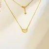 Método Antiguo Oro de Arena Pequeño Colgante Dorado Kou de Paz Collar Collar de Corazón Brillante Incrustado de Diamantes Joyería Versátil Simple de Alta Gama