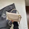 Bolsa feminina altamente estilosa e com textura única, nova moda verão 2026, pequena bolsa quadrada da moda, bolsa de ombro simples estilo coreano