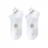 Calcetines de Venta Caliente Transfronteriza al por Mayor, Calcetines Desechables de Color Sólido Negro y Blanco, Calcetines de Algodón Unisex, Calcetines Desechables Diarios de Longitud Media-Corta Anti-Olor