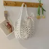 Bolso de Paja Tejido Hueco para Mujer 2026 Nuevo Estilo Primavera Bolso de Hombro de Cubo de Gama Alta Estilo Resort Costero Bolso de Playa