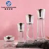 Botellas de vidrio pequeñas y delgadas en stock de 40-120 ml para agua, loción y esencia, frascos vacíos de 30 g 50 g para crema facial, materiales de embalaje